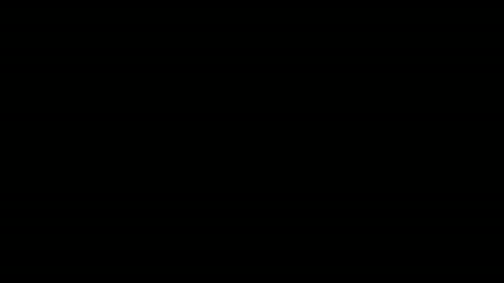 A professional roofer working on a residential roof